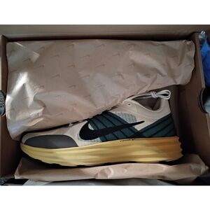 Nike Cream and Black Running Shoes with Green Accents